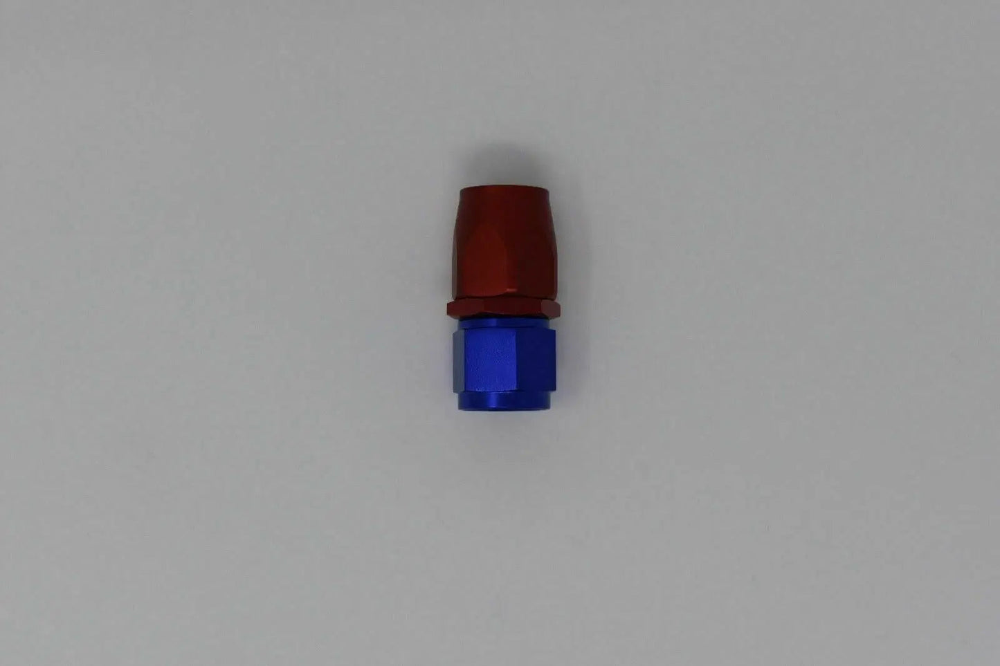 Jack Spania Racing 10 AN straight billet swivel steel hose end fitting for oil, fuel, and water in engine applications.