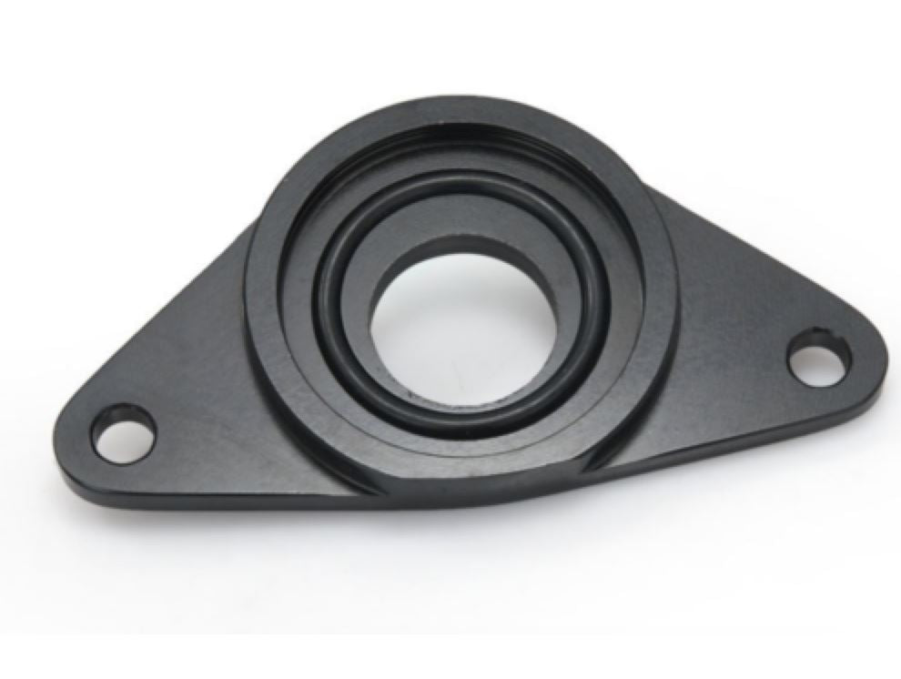 Jack Spania Racing SSQV blow off valve installed on a Subaru WRX or STI engine, showcasing the engine part and adapter.