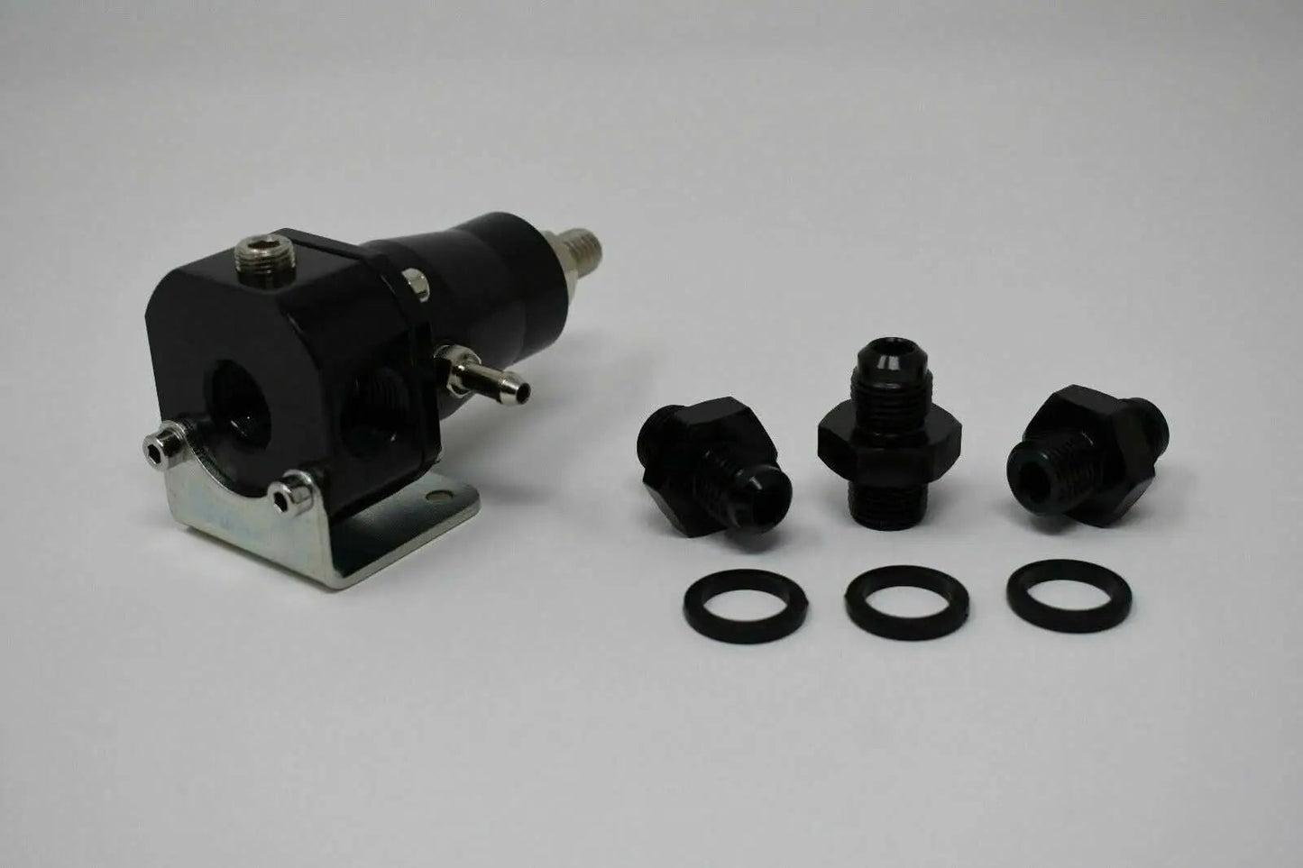 Jack Spania Racing adjustable EFI fuel pressure regulator with gauge, 30-70 PSI, AN6 bypass engine part for fuel system control.