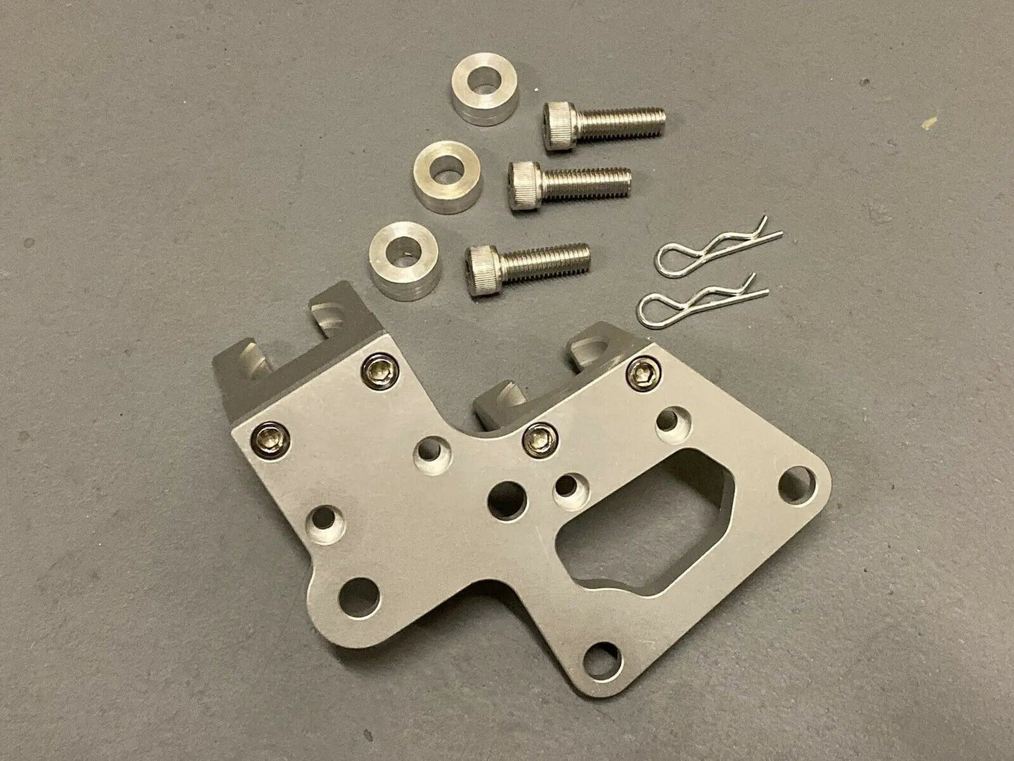 Jack Spania Racing K20 K24 K Series transmission bracket for Honda Integra, CRX, and hatchback K swap models.