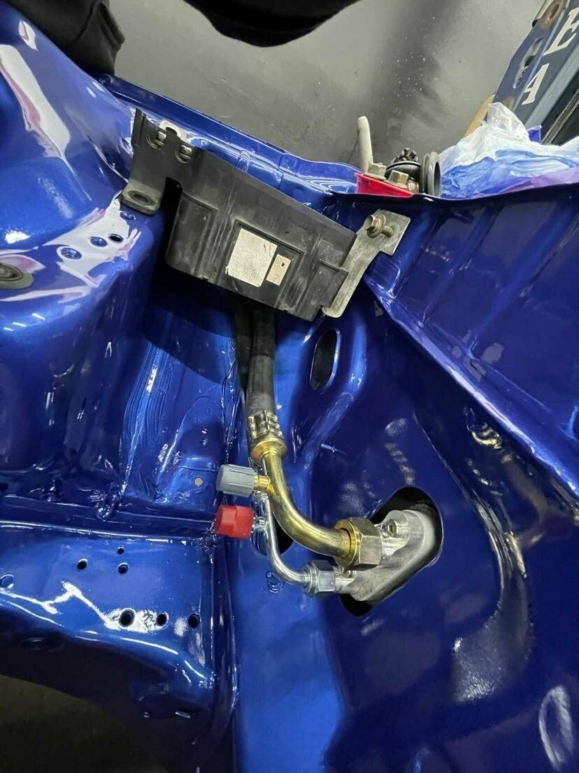 Jack Spania Racing D Series AC Line Tuck Kit installed in Honda Civic Si and Acura Integra DC2 engine bay.