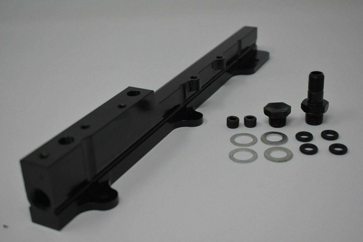 Fuel pressure regulator gauge rail for Honda Acura B D Series engines, by Jack Spania Racing, showing the regulator and gauge components.
