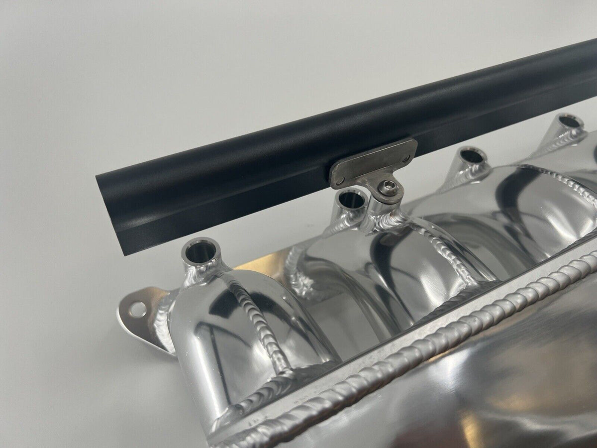 Center feed intake manifold fuel rail for BMW N54 135i, 335i, 535i engine, compatible with E90 models, by Jack Spania Racing.