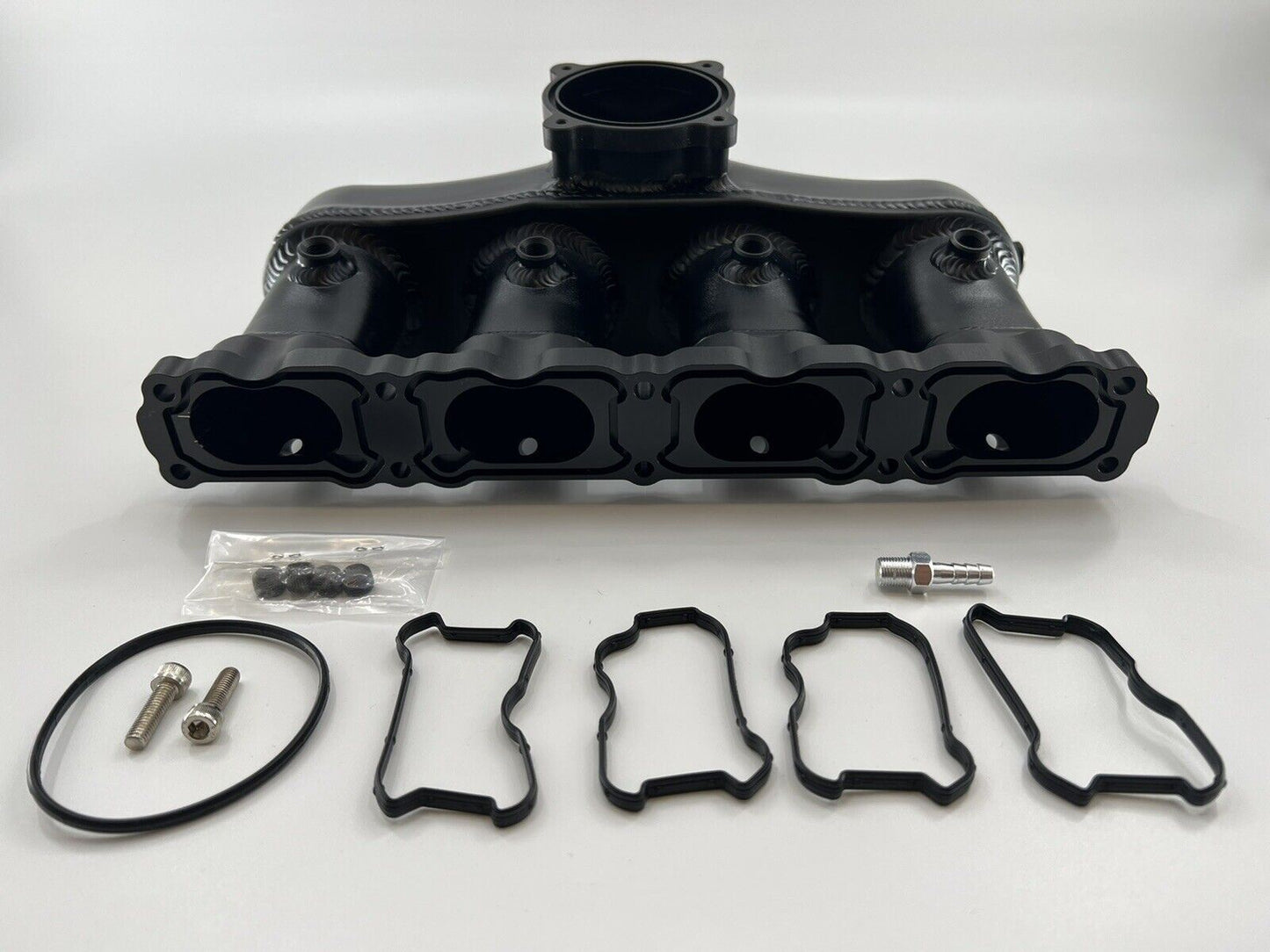 Jack Spania Racing intake manifold for VW Audi EA888 Gen 3 1.8T 2.0T engine parts, showing the polished metal design.