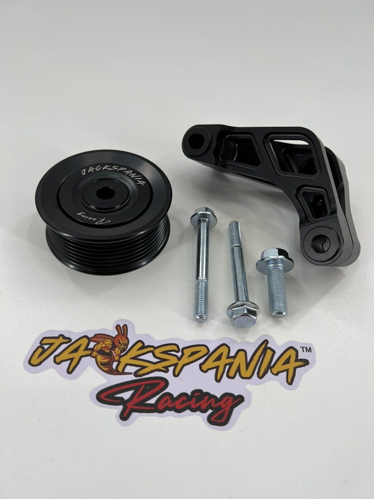 Jack Spania Racing K Series Idler Bracket Kit for K24A engine, includes pulley and tensioner for power steering pump removal.