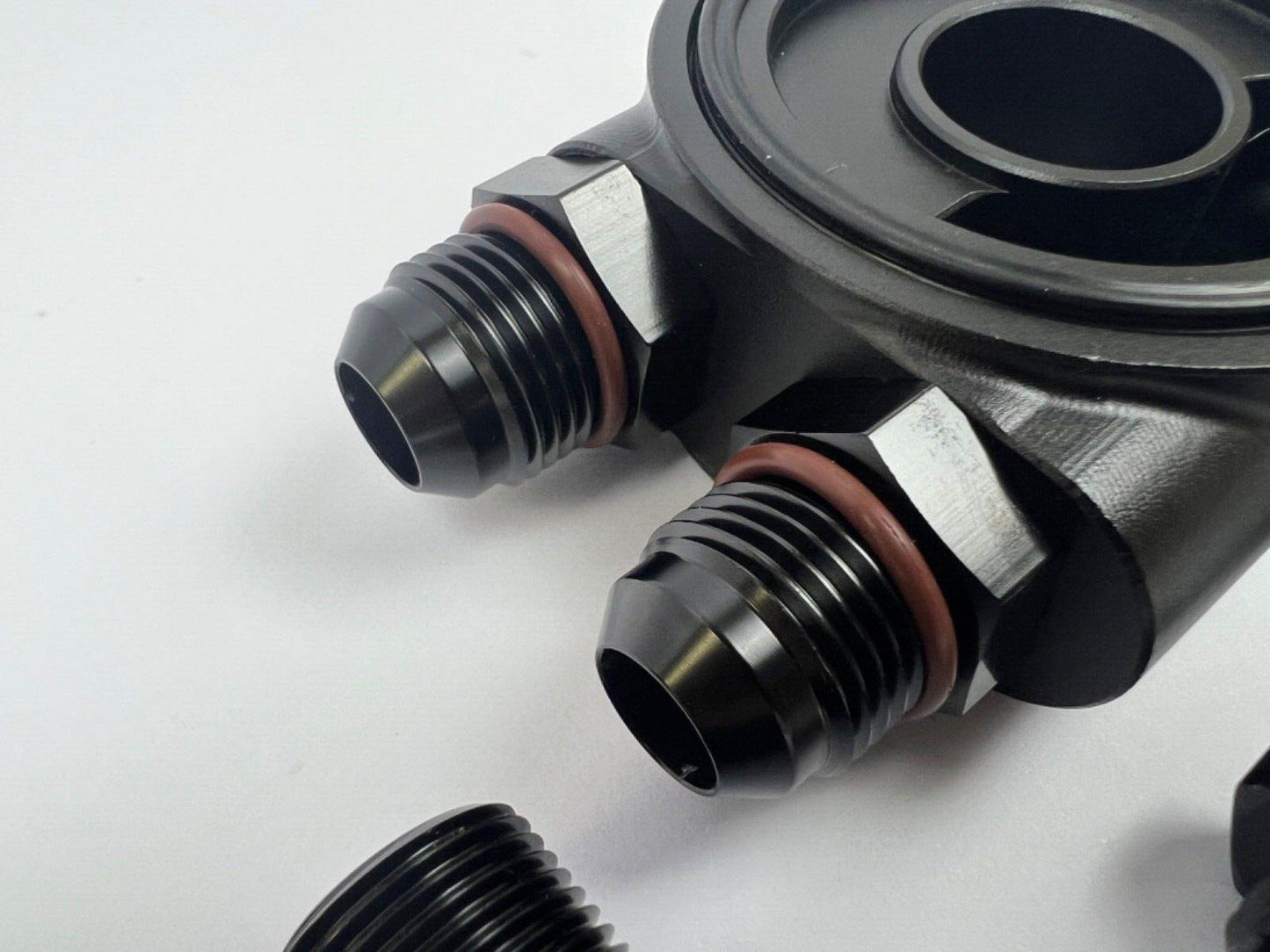 JackSpania Racing billet 10AN ORB thermostatic oil sandwich plate adapter with M20 x 1.5 threads and 180-degree fitting for engine oil system