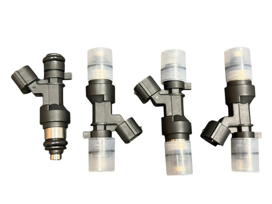 Set of 4 JackSpania Racing K Series K20 K24 flow-matched 1200cc fuel injectors for Honda and Acura engines.