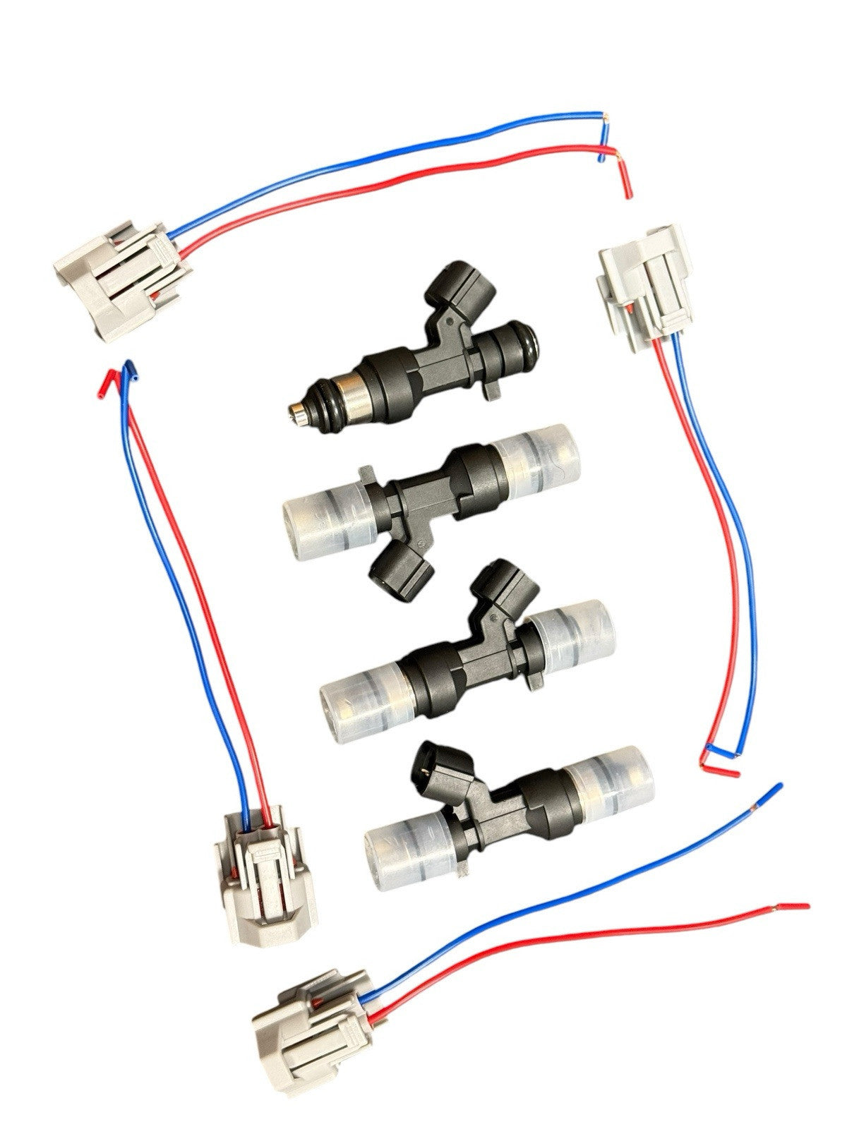 Set of four JackSpania Racing K Series 1200cc fuel injectors for Honda and Acura K20 and K24 engines.