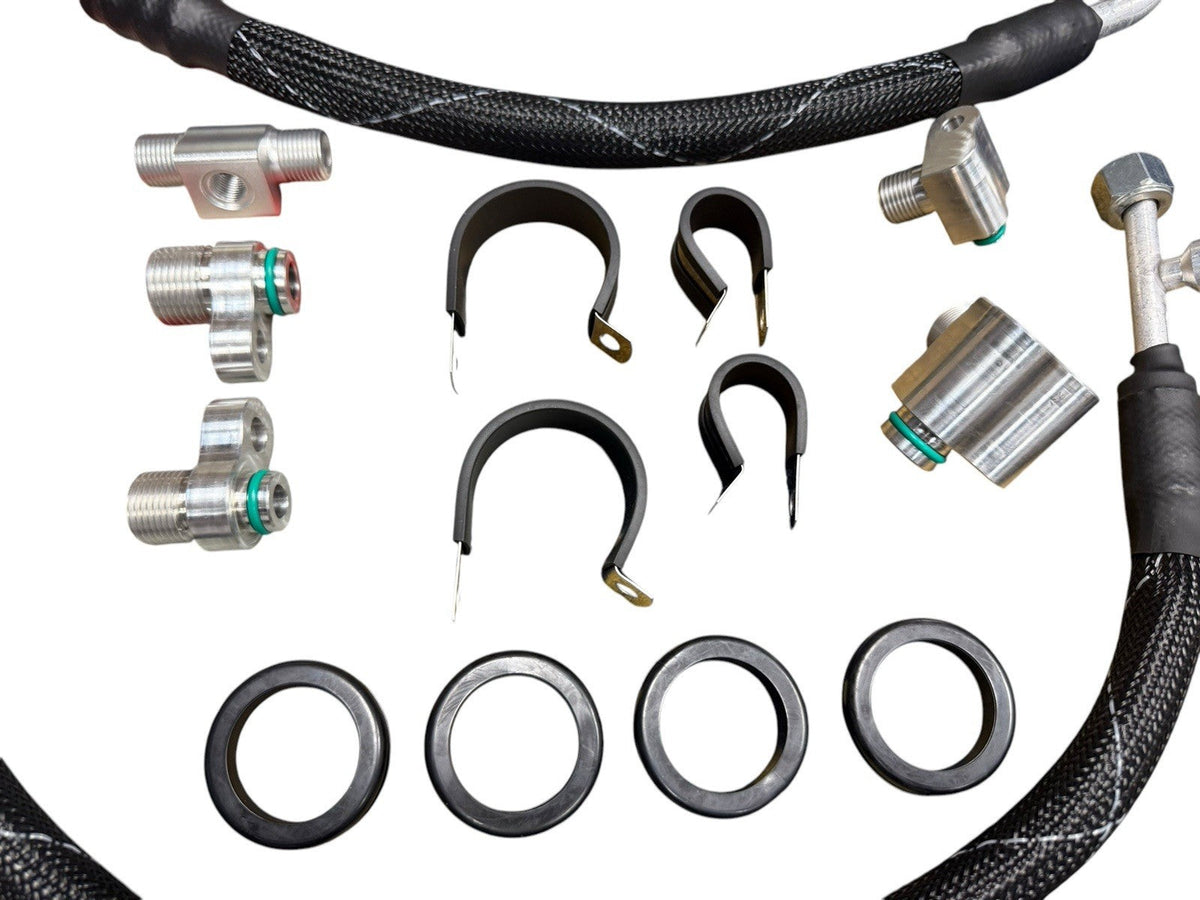 JackSpania Racing K Series K20 K24 AC line tuck kit installed in a Honda Acura Civic Type R engine bay, showcasing engine parts.