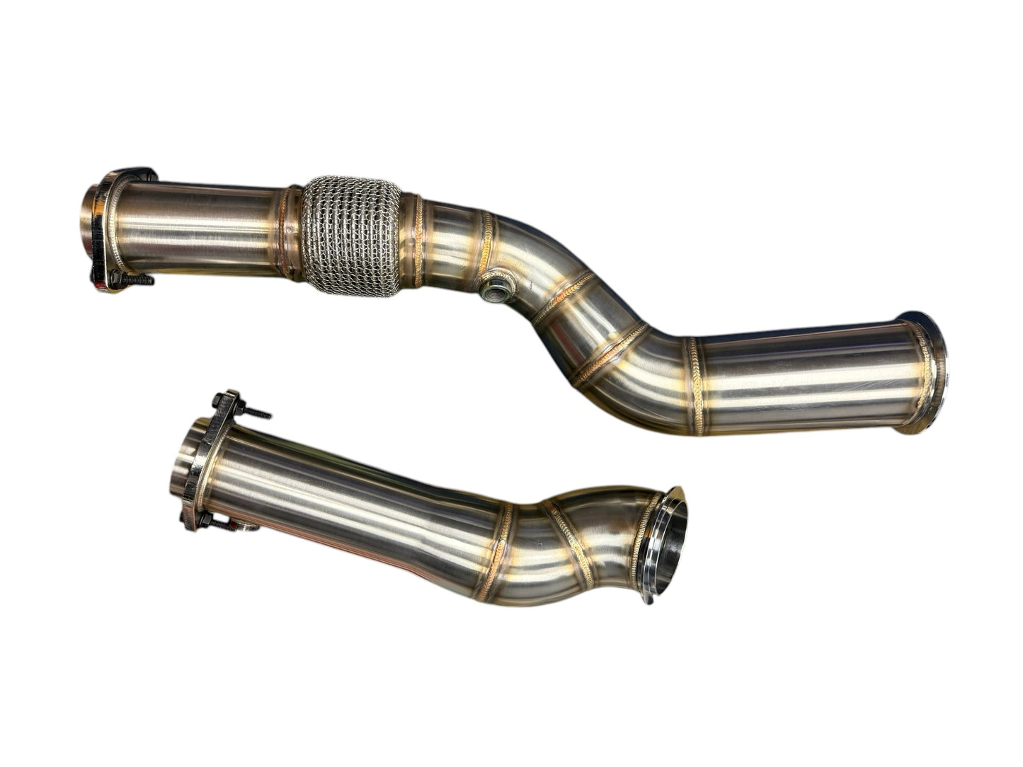 High flow non-catted BMW S58 M2 G80 M3 G82 M4 G87 M2 downpipes by JackSpania Racing, showcasing polished exhaust pipe components.
