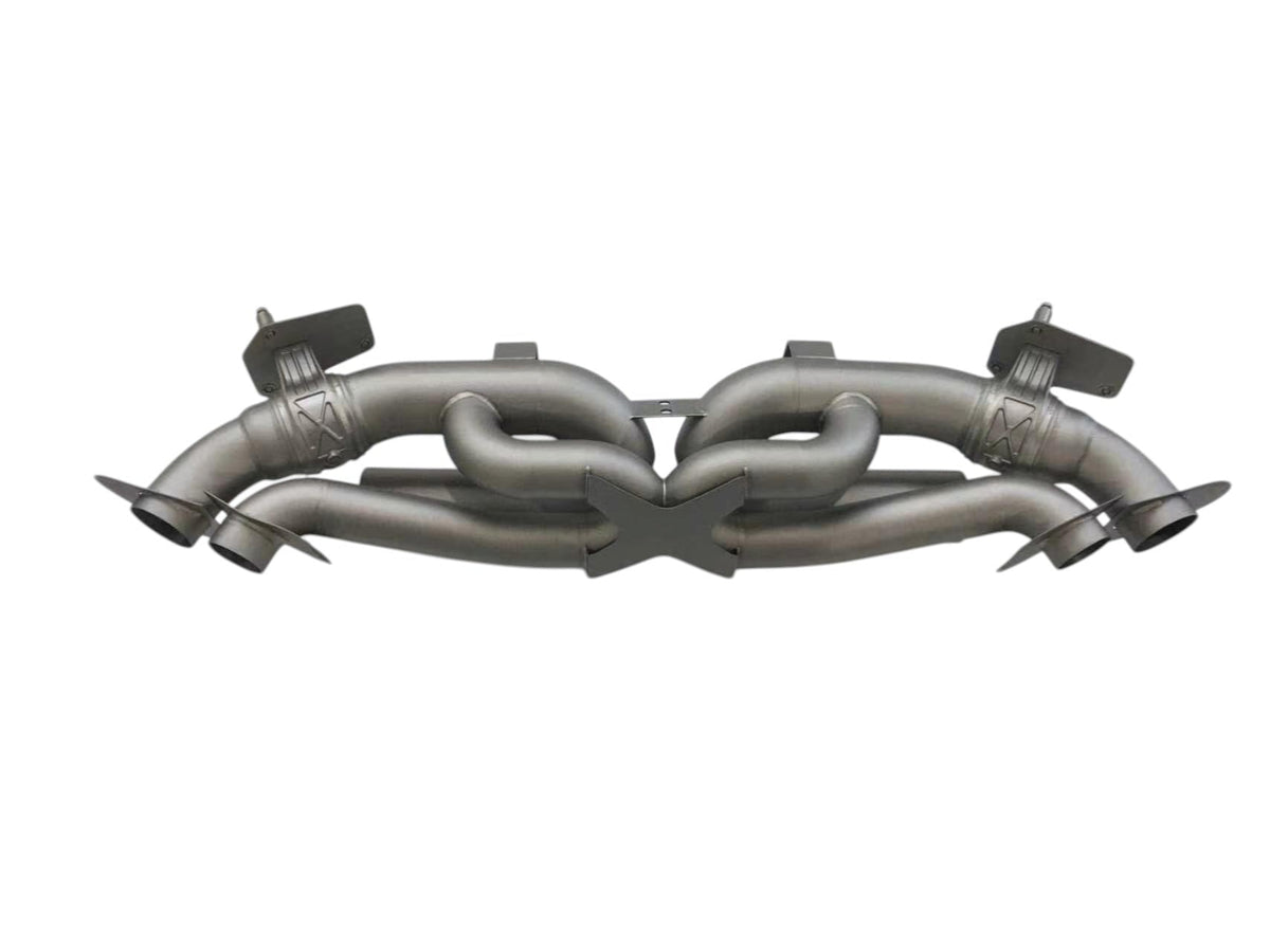 Titanium valved sport exhaust system for Porsche 992 Carrera Turbo by JackSpania Racing, showing sleek exhaust pipes and valves.