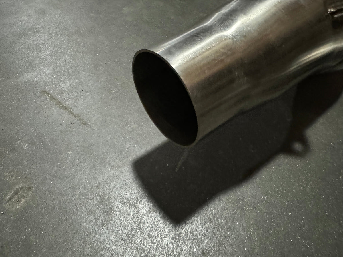 3-inch stainless steel downpipe for BMW S55 F80 F82 F87 M3 M4 F80 F82 F83 from JackSpania Racing, showing the exhaust pipe with flanges.