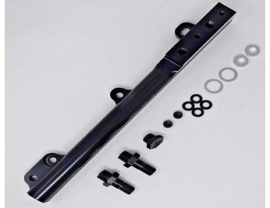 Jack Spania Racing D Series fuel rail for Honda Civic Si, Integra, and CRX non-VTEC engine parts, shown mounted on engine.