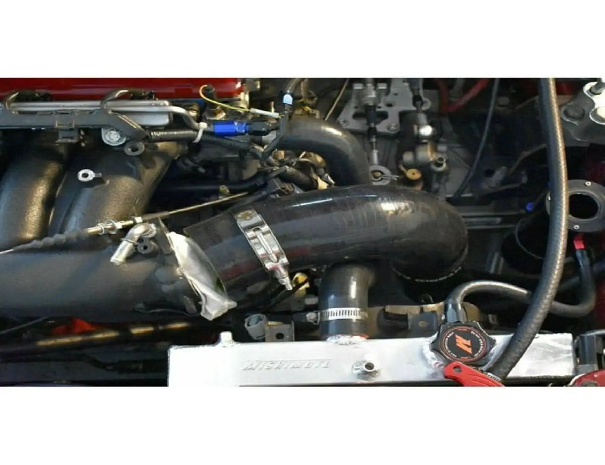 Upper coolant hose for Honda Acura K-Series engines, by Jack Spania Racing, designed for K20, K24, DC2 Type R, EG, EK models.