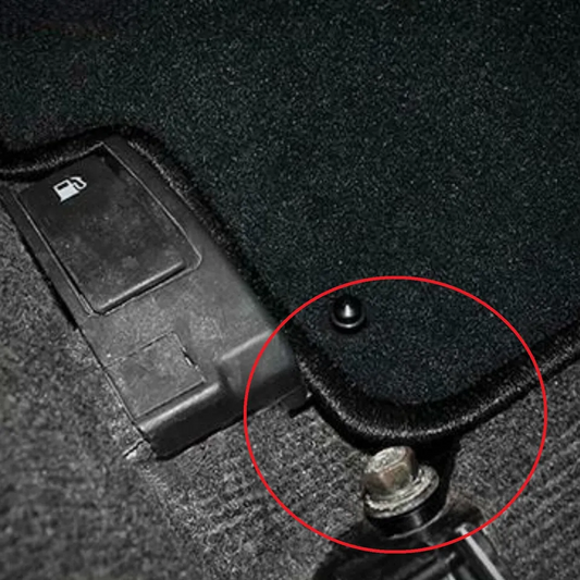 Driver side carpeted floor mat retention bracket for Subaru WRX and STi, designed by JackSpania Racing, interior car accessory.