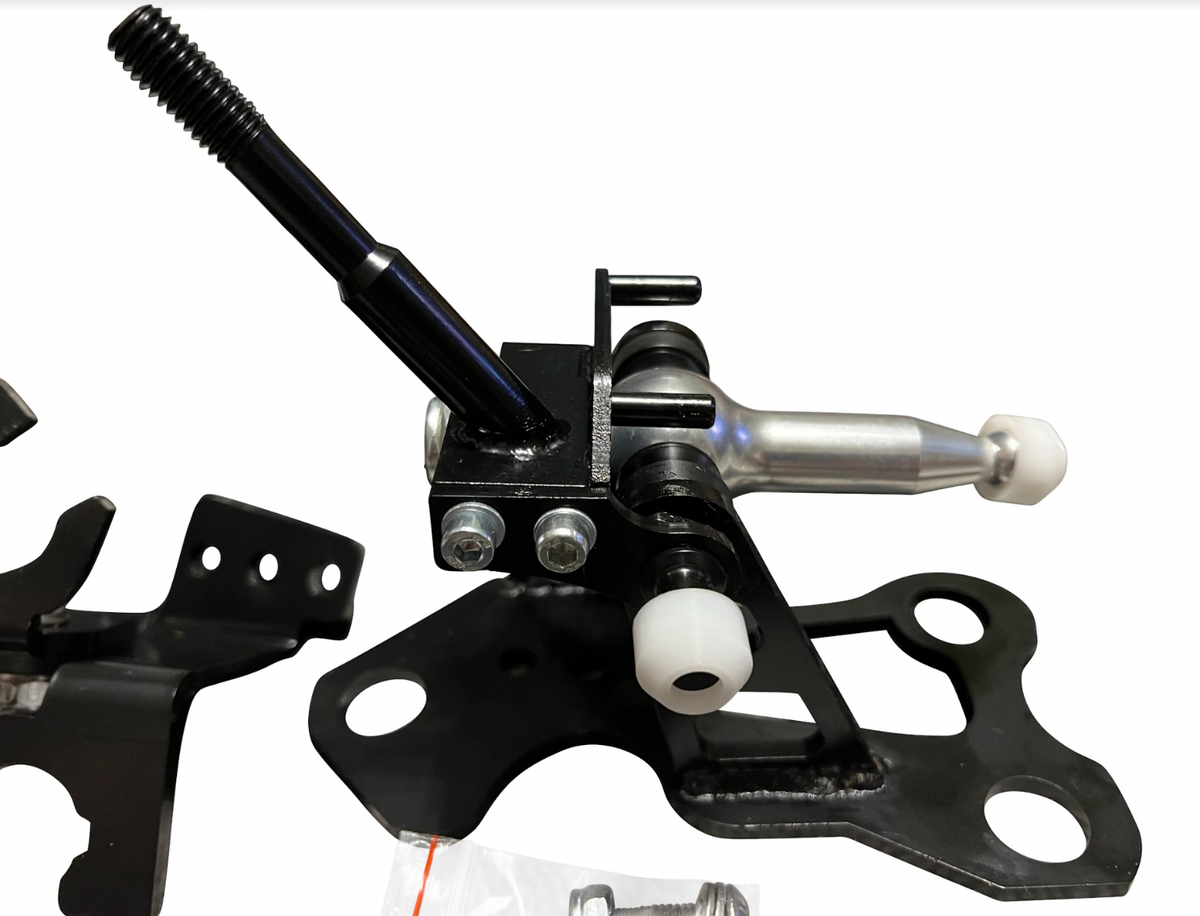 OEM K20z3 shift cable bracket for 8th Gen Honda Civic transmission, by Jack Spania Racing, shown in a close-up image.
