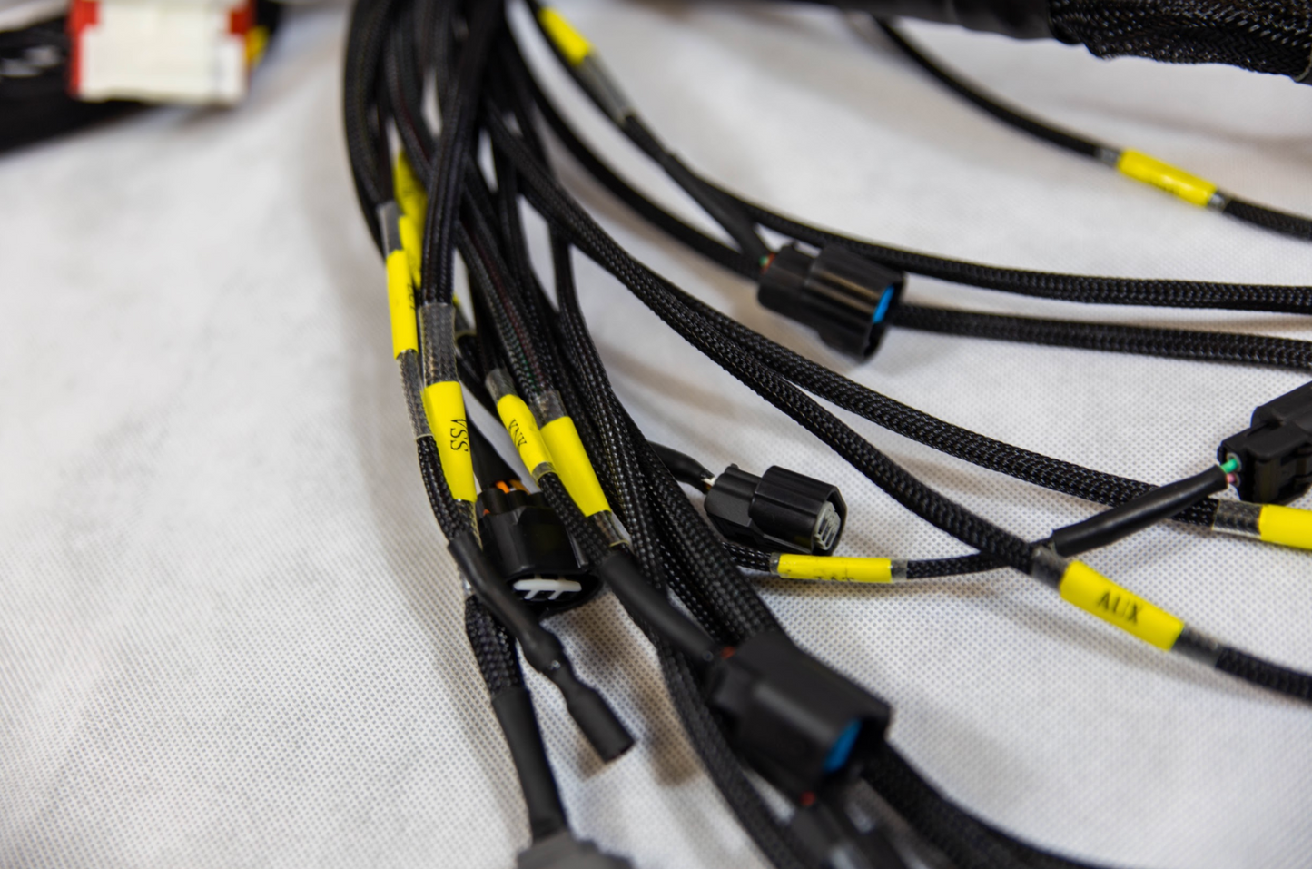Jack Spania Racing K20 K24 K-Series tucked engine harness for Honda Acura K-swap, compatible with RSX and Civic Si EP3 engines.