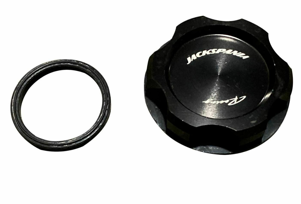 Jack Spania Racing B D F H J K Series valve cover oil cap for engine parts, showing the black metal design and branding.