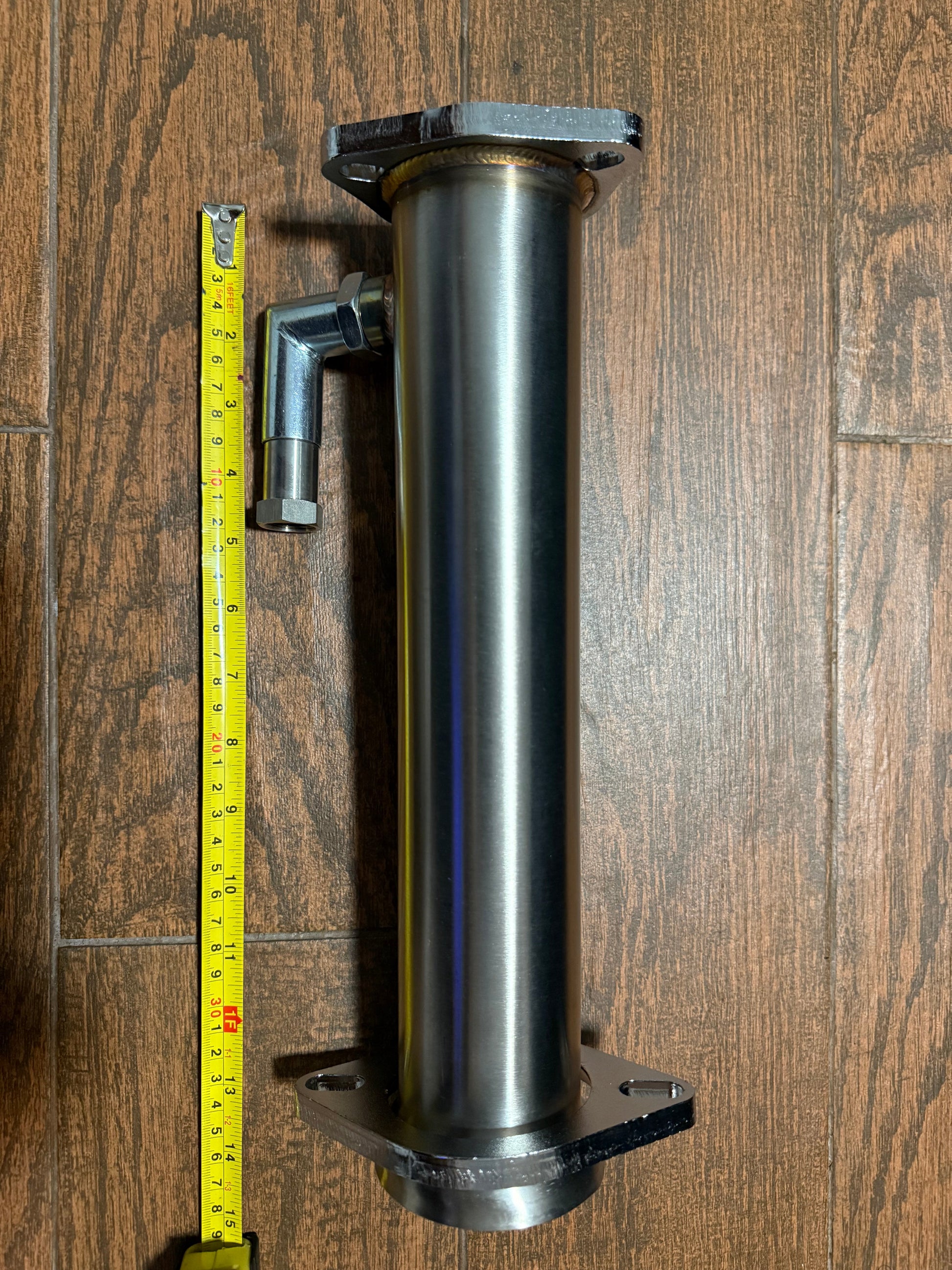 Universal 2.5-inch bolt-on test pipe for exhaust systems by JackSpania Racing, shown in the image.