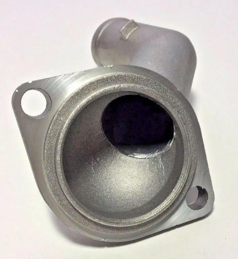 Jack Spania Racing VW MK4 Golf Jetta GTI TT 1.8T cast engine block thermostat coolant flange showing the metal part and mounting details.
