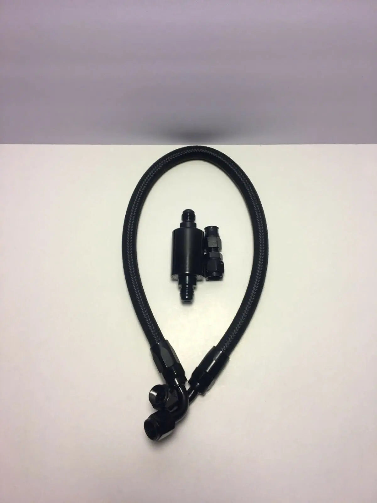 Jack Spania Racing B D-Series fuel feed and return line kit for B16, B18, B20, D15, D16 engines, with engine parts in the image.