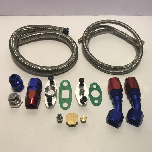 Jack Spania Racing stainless turbo oil drain return and feed line kit with T3 T4 T04E T60 T61 T70 engine parts shown.