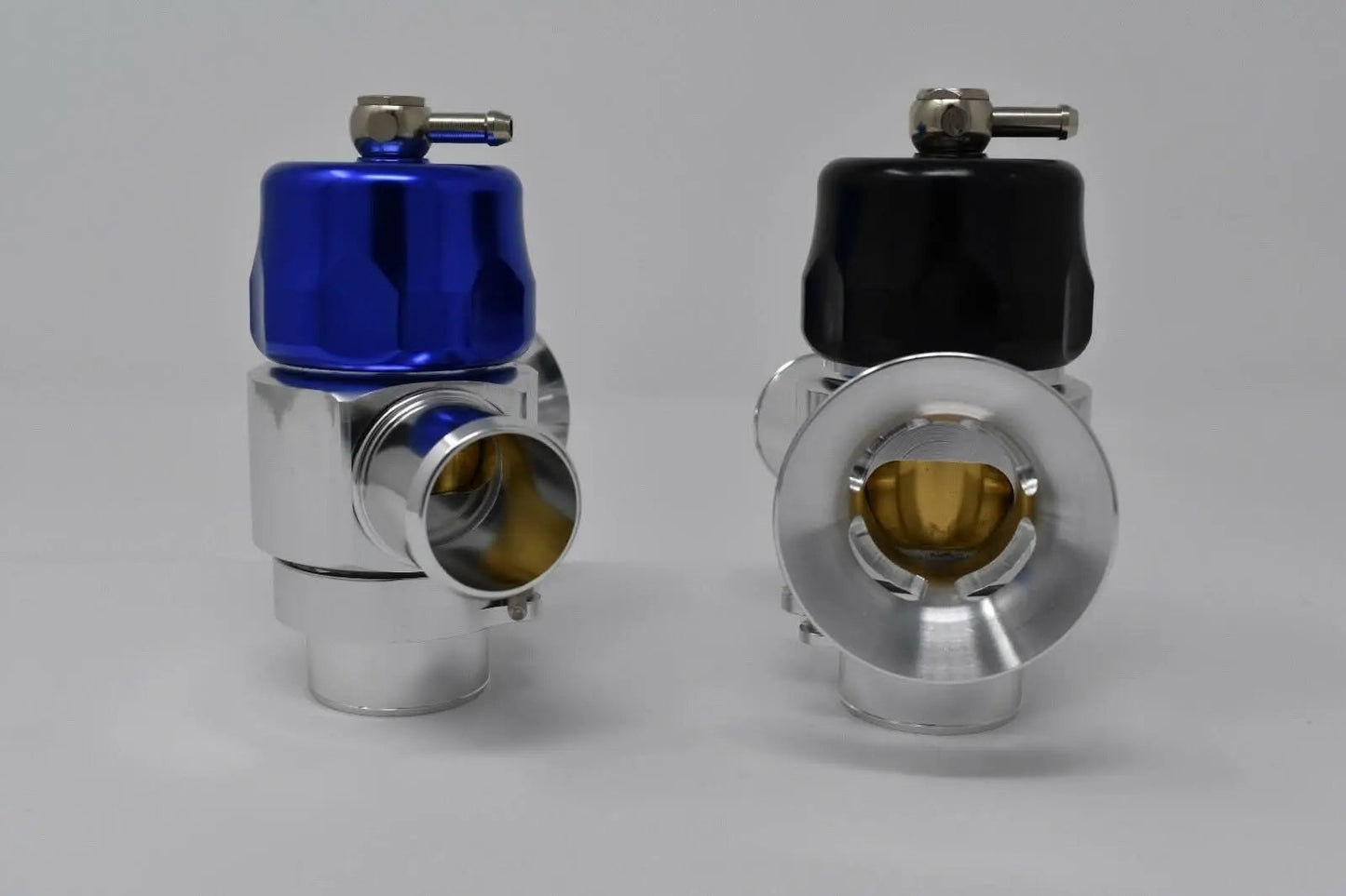 Dual port hybrid BOV for Mitsubishi Lancer Evo, Ralliart, Colt GSR turbo engine by Jack Spania Racing, shown installed on engine.
