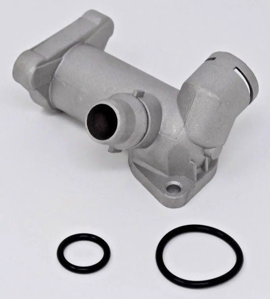 Cast aluminum coolant flange with temperature sensor for Audi B5 A4 1.8T engine, by Jack Spania Racing, showing the component and sensor port.