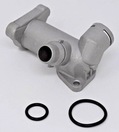 Cast aluminum coolant flange with temperature sensor for Audi B5 A4 1.8T engine, by Jack Spania Racing, showing the component and sensor port.