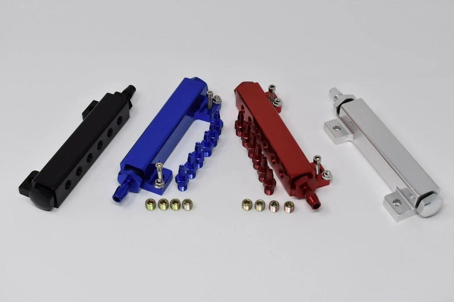 Jack Spania Racing 6 port vacuum block intake manifold kit with fuel wastegate and turbo boost components for engine performance.