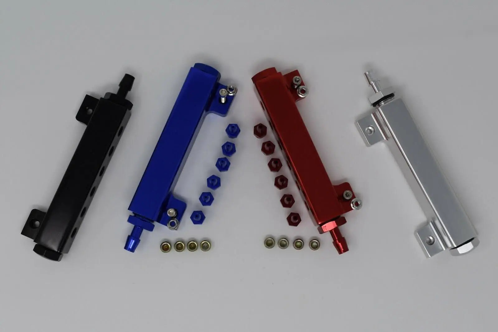 Jack Spania Racing 6-port vacuum block intake manifold kit with fuel, wastegate, turbo boost, and NOS fittings for engine performance.