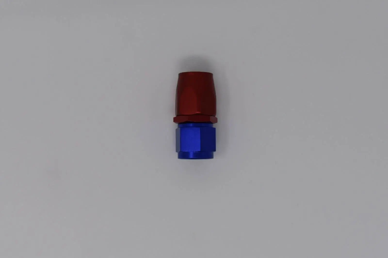 Jack Spania Racing 8 AN straight billet swivel steel hose end fitting for oil, fuel, or water engine parts.