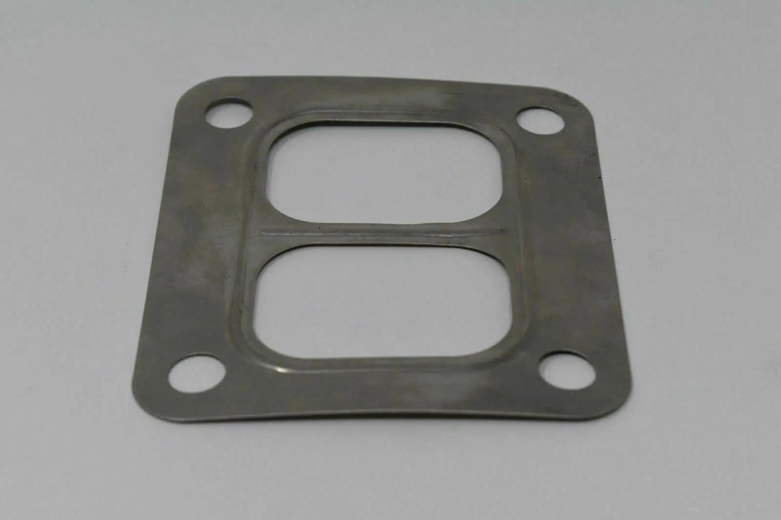 Jack Spania Racing T4 Turbo Manifold Inlet Flange Gasket for twinscroll divided setup, made of durable 304 stainless steel, engine part