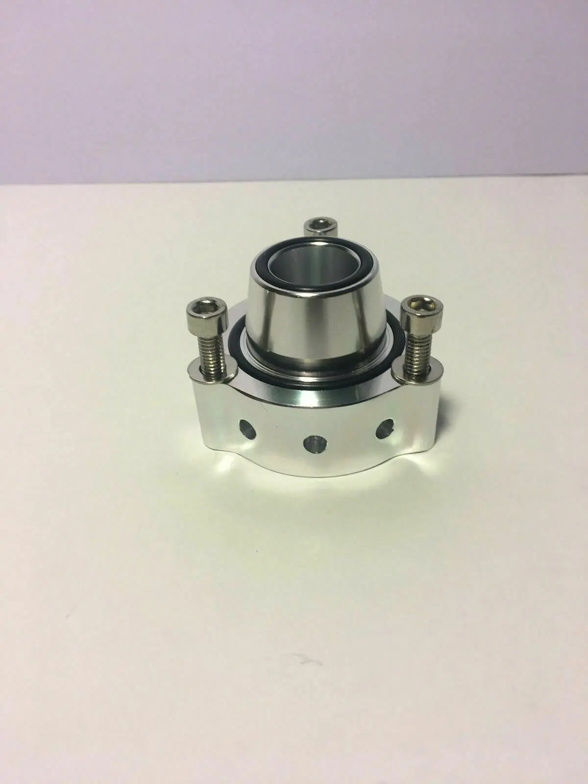 Jack Spania Racing VW Audi blow off valve spacer for TSI FSI TFSI engines, showing the metal diverter component on a white background.