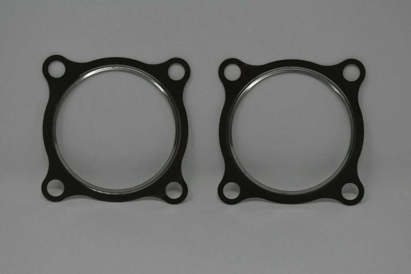 Stainless steel 3-inch turbo downpipe gasket for GT30 GT35 T3 turbochargers, from Jack Spania Racing engine parts.