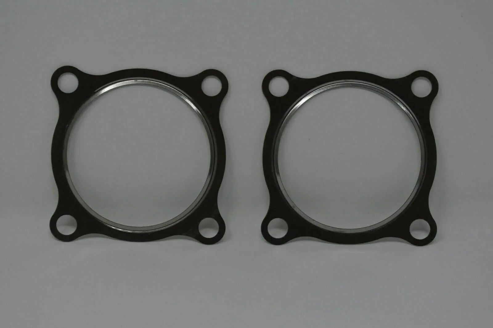 Stainless steel 3-inch turbo downpipe gasket for GT30 GT35 T3 turbochargers, from Jack Spania Racing engine parts.