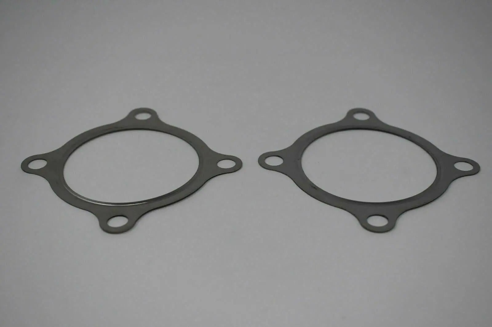 Stainless steel 2x 3-inch 4-bolt turbo downpipe gasket for GT30 GT35 T3 turbochargers, compatible with Jack Spania Racing engine parts