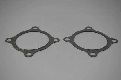Stainless steel 2x 3-inch 4-bolt turbo downpipe gasket for GT30 GT35 T3 turbochargers, compatible with Jack Spania Racing engine parts