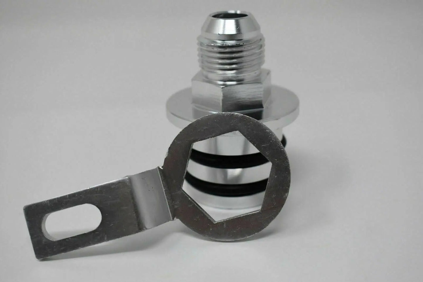 Honda Acura B Series engine block plug adapter with 10AN breather fitting, designed for catchcan installation by Jack Spania Racing.
