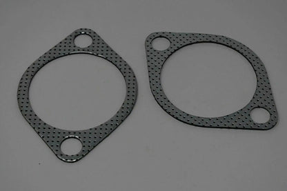 Two 3-inch downpipe to exhaust gaskets for Subaru WRX STI, EVO X, and Legacy, by Jack Spania Racing, showing gasket details.