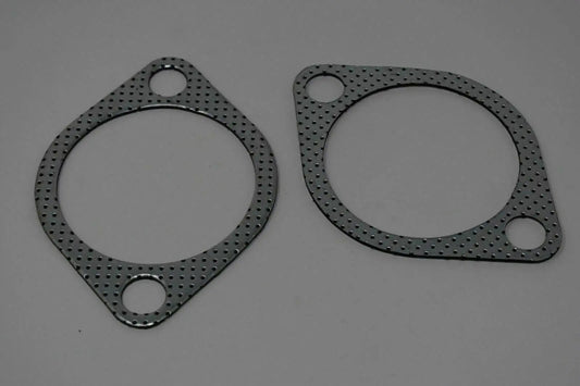 Two 3-inch downpipe to exhaust gaskets for Subaru WRX STI, EVO X, and Legacy, by Jack Spania Racing, showing gasket details.