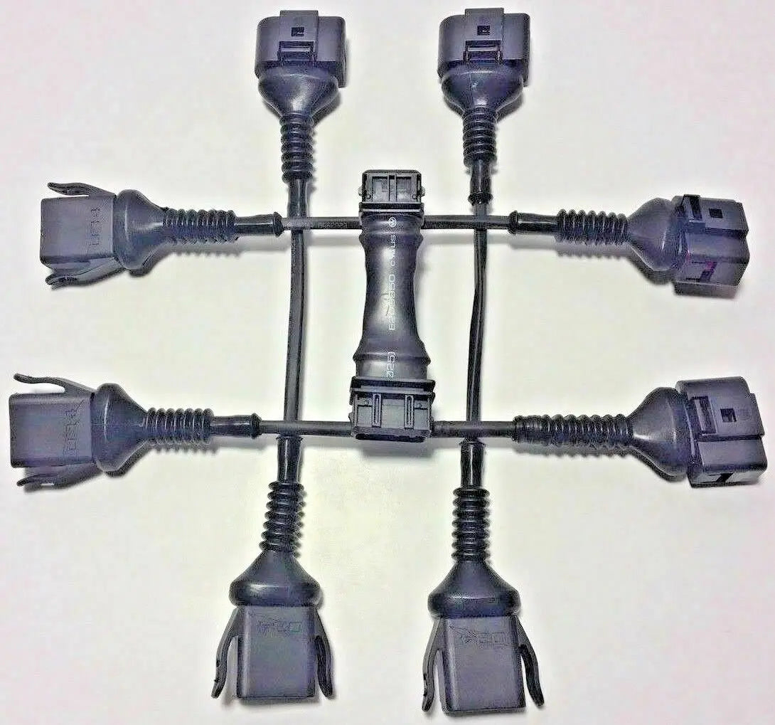 Audi B5 A4 1.8T coil conversion harness and ICM delete kit by Jack Spania Racing, showing wiring and engine components.