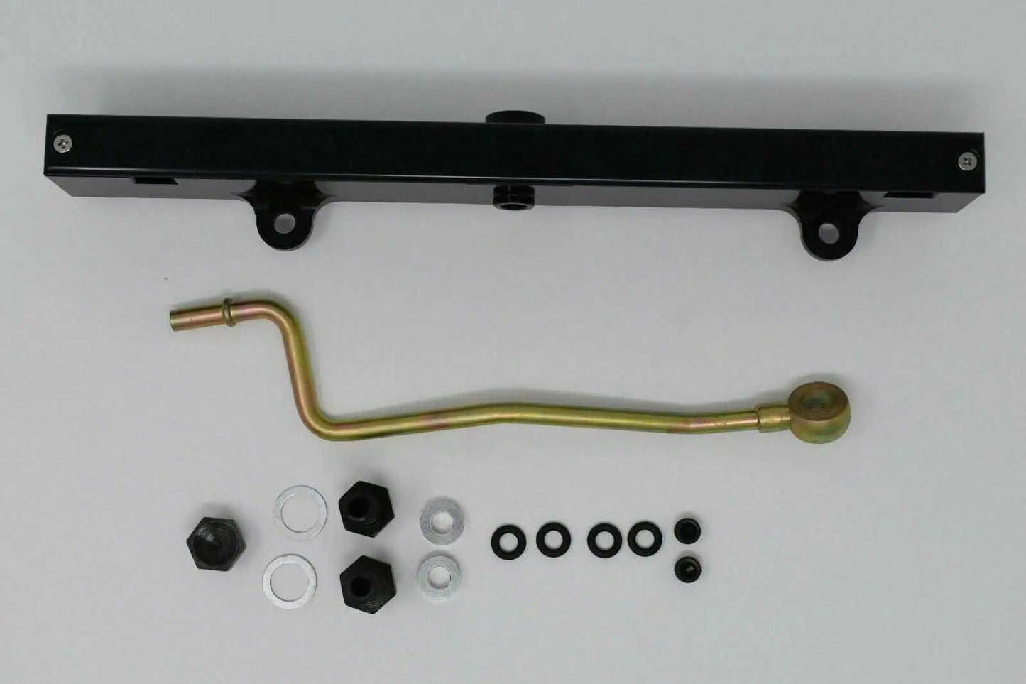 Jack Spania Racing K-Series billet aluminum high flow fuel rail for K20 and K24 engines, with detailed mounting features.
