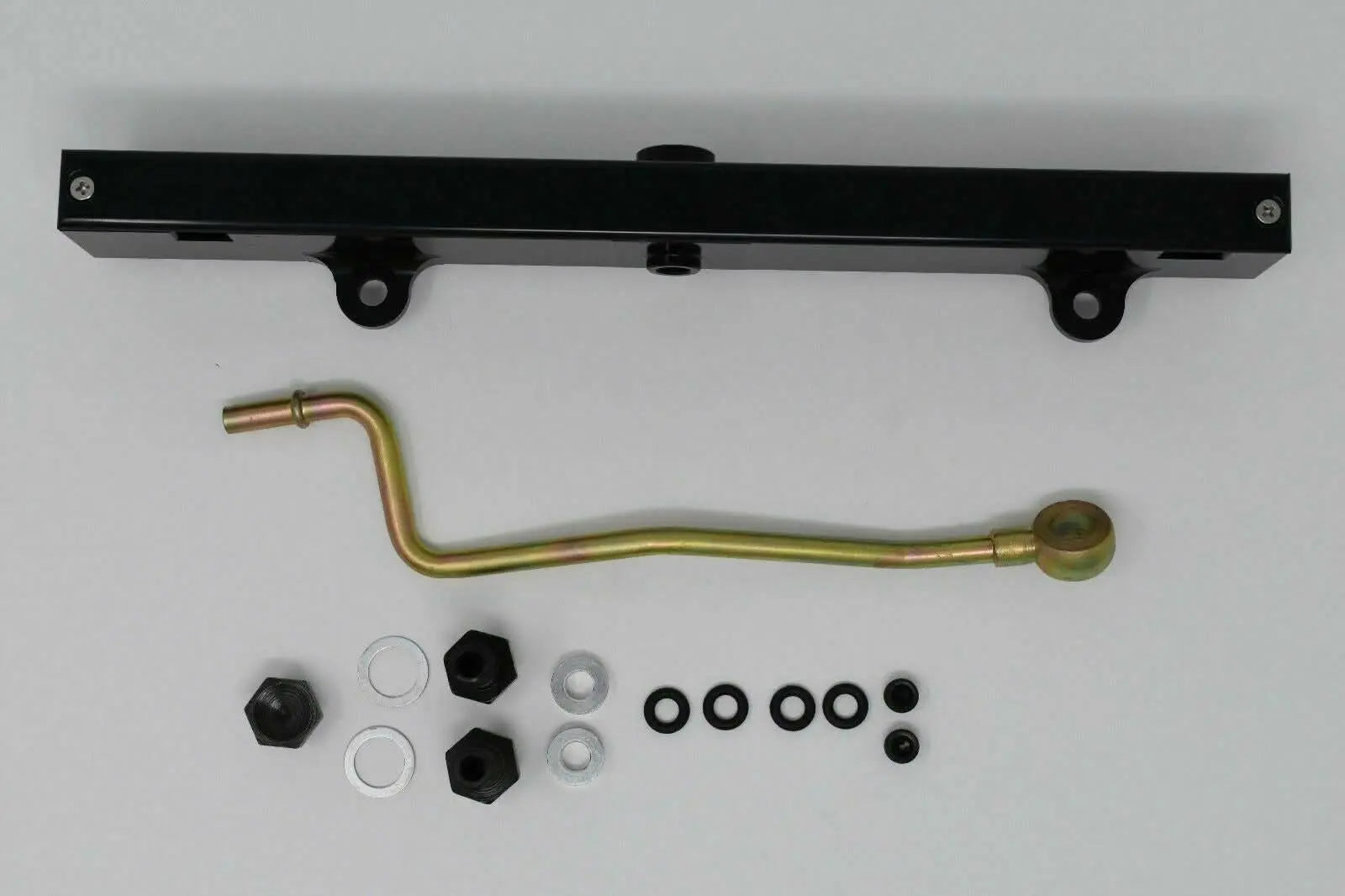 Jack Spania Racing K-Series billet aluminum high flow fuel rail for K20 and K24 engines, with detailed mounting features.