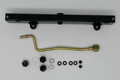 Jack Spania Racing K-Series billet aluminum high flow fuel rail for K20 and K24 engines, with detailed mounting features.