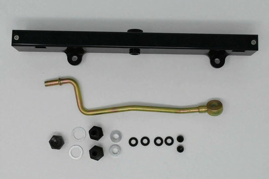 Jack Spania Racing K-Series billet aluminum high flow fuel rail for K20 and K24 engines, with detailed mounting features.