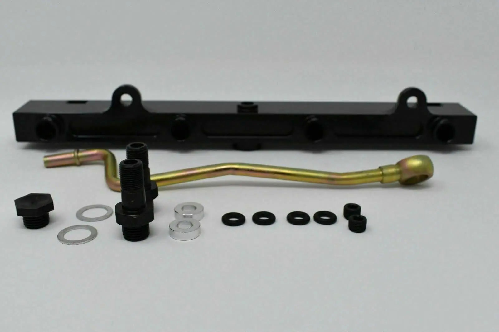 Jack Spania Racing K-Series billet aluminum high flow fuel rail for K20 and K24 engines, shown installed on engine with fittings