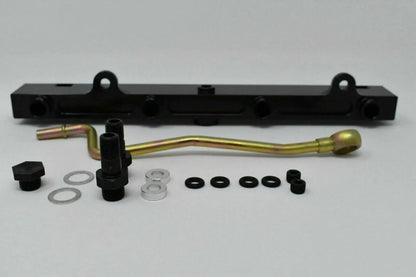 Jack Spania Racing K-Series billet aluminum high flow fuel rail for K20 and K24 engines, shown installed on engine with fittings