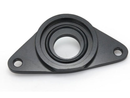 Jack Spania Racing SSQV blow off valve installed on a Subaru WRX or STI engine, showcasing the engine part and adapter.
