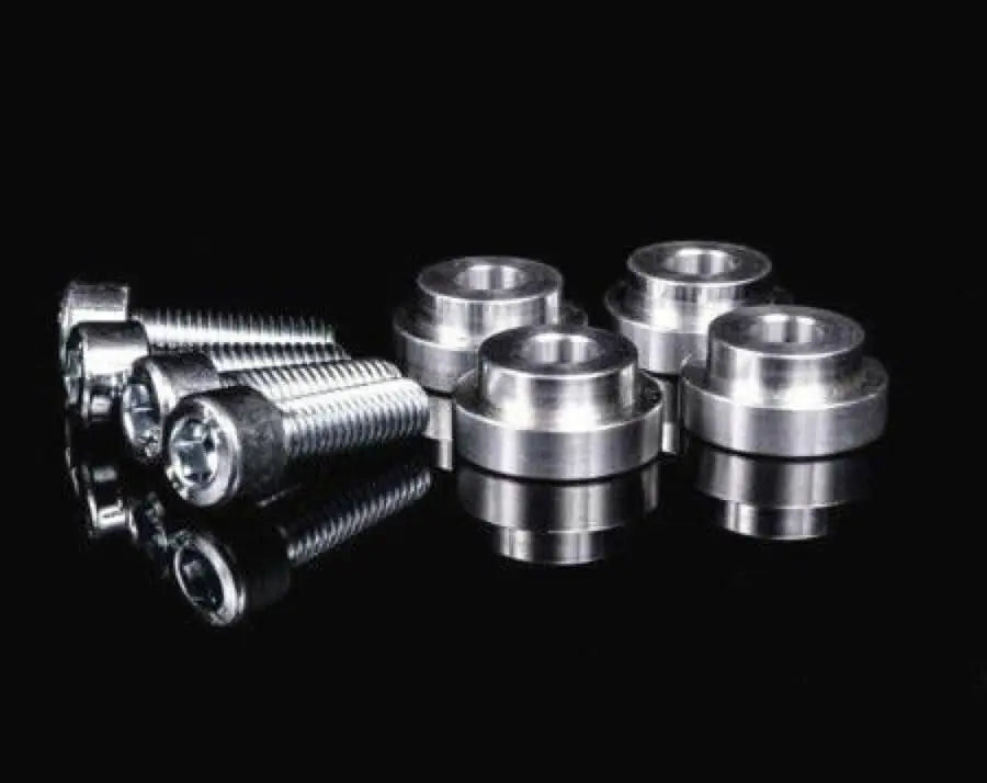 Jack Spania Racing billet shifter box bushings for Acura and Honda K series transmission swaps, shown in close-up.